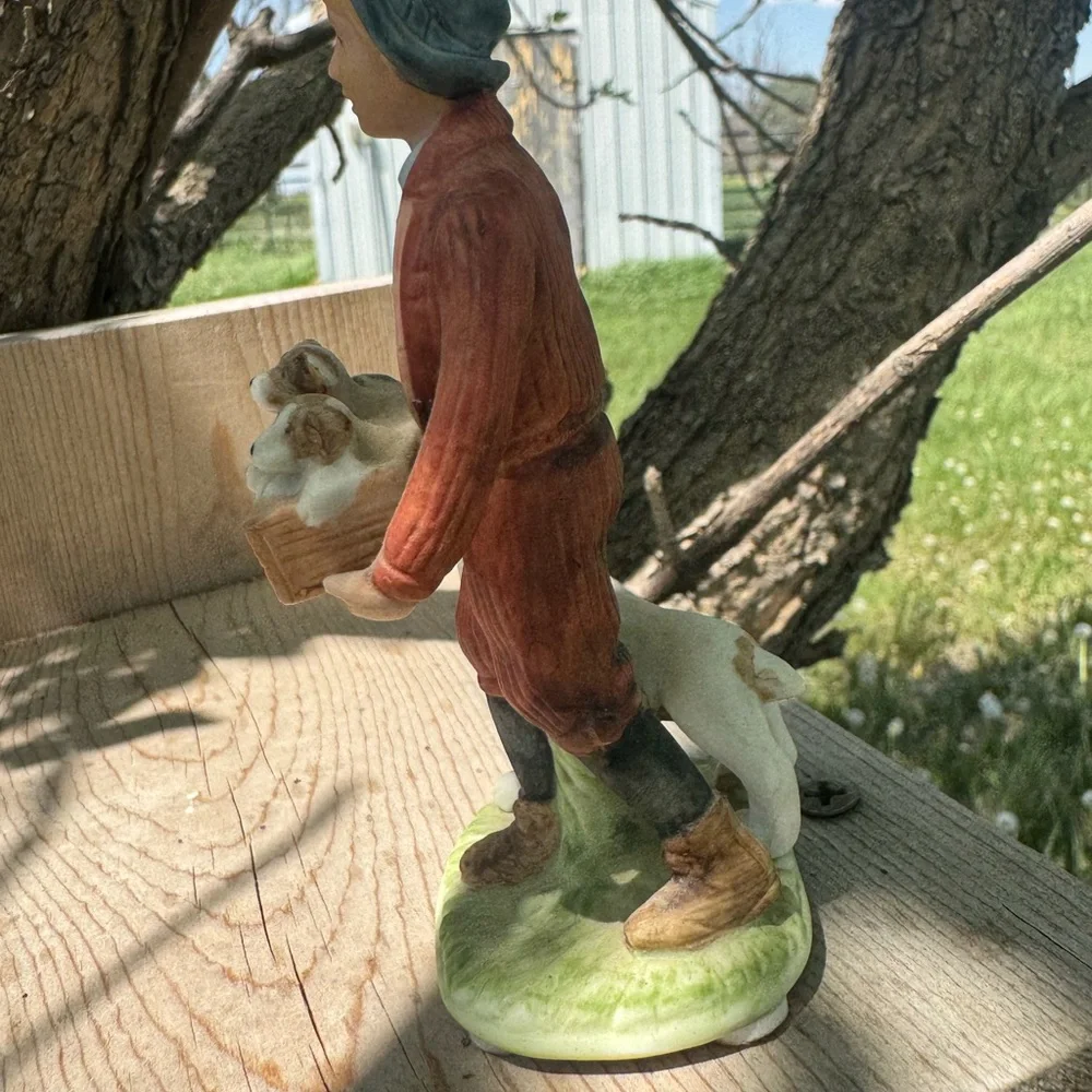Norman Rockwell Puppy Love Figurine of Boy with Puppies